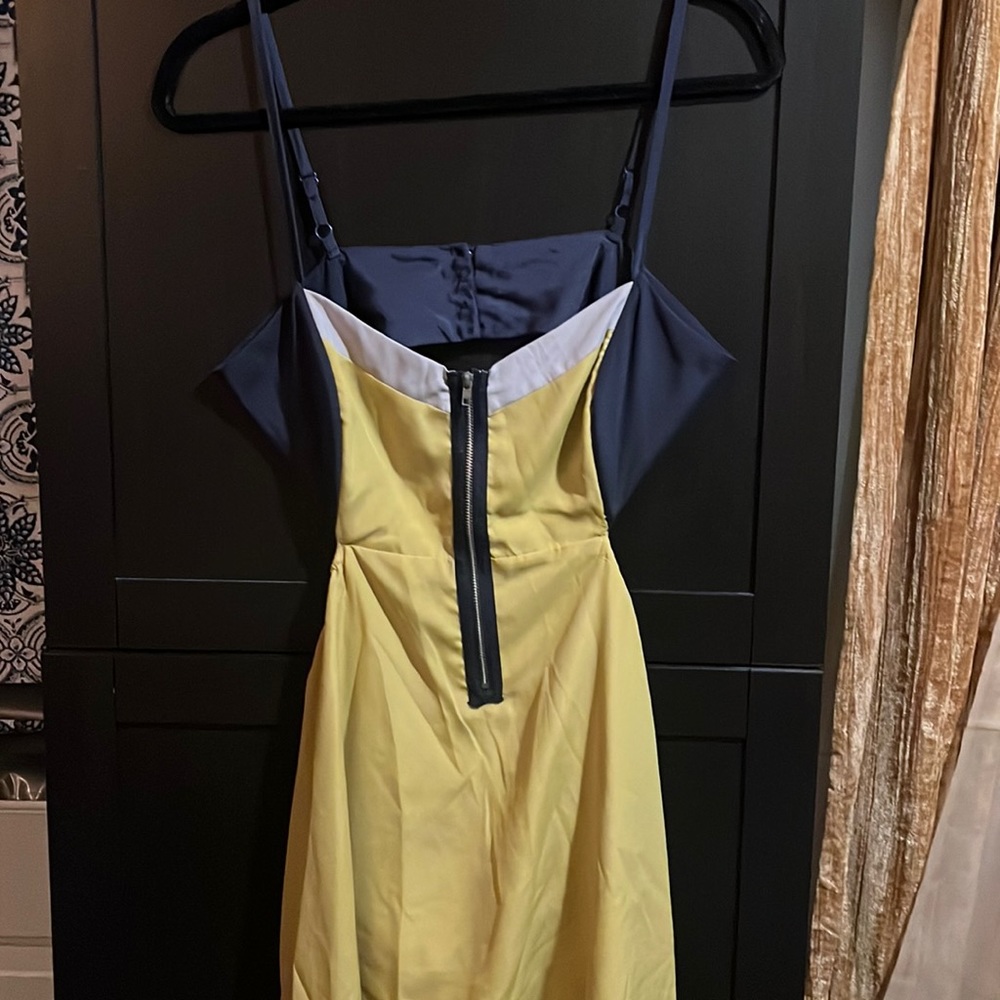 Dress with low drop in the back with hi low hem